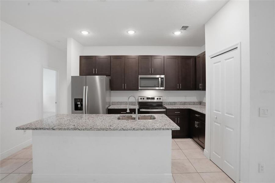 Furnished interior view inside a new home in , Kissimmee (Image 11).
