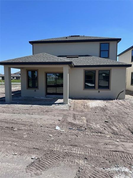 Exterior details and patio area of a home in Grasslands West, Lakeland (Image 3). Exterior details and patio area of a home in Grasslands West, Lakeland (Image 3).