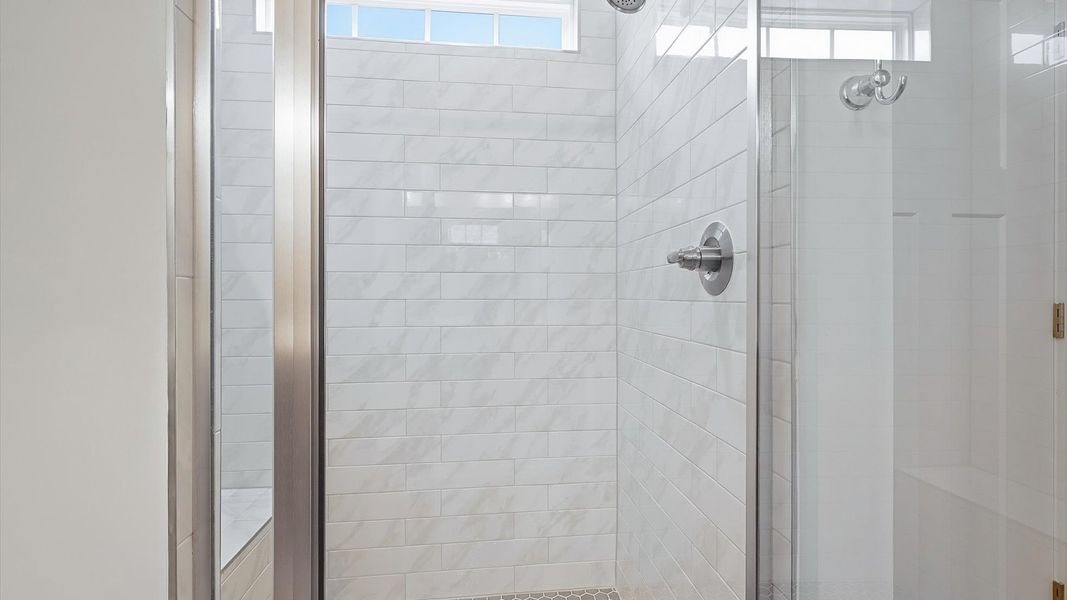 Tasteful primary bath with modern finishes, a walk-in shower, and natural light located in Piedmont, SC