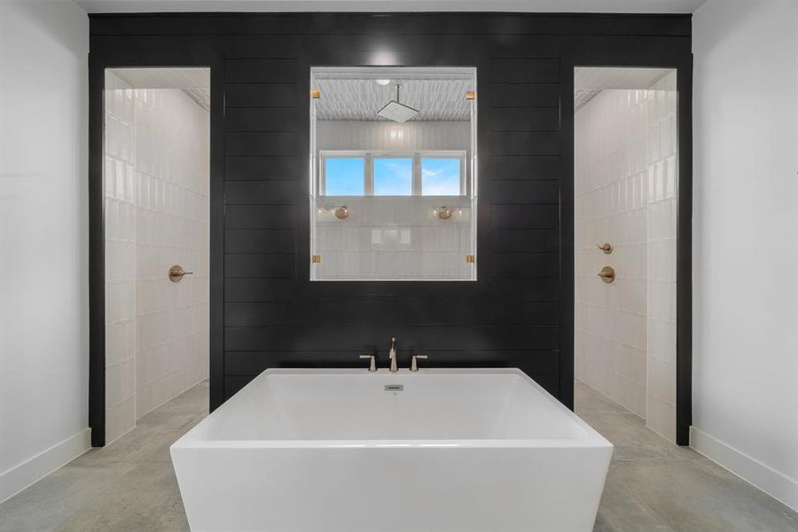 Bathroom featuring tile walls