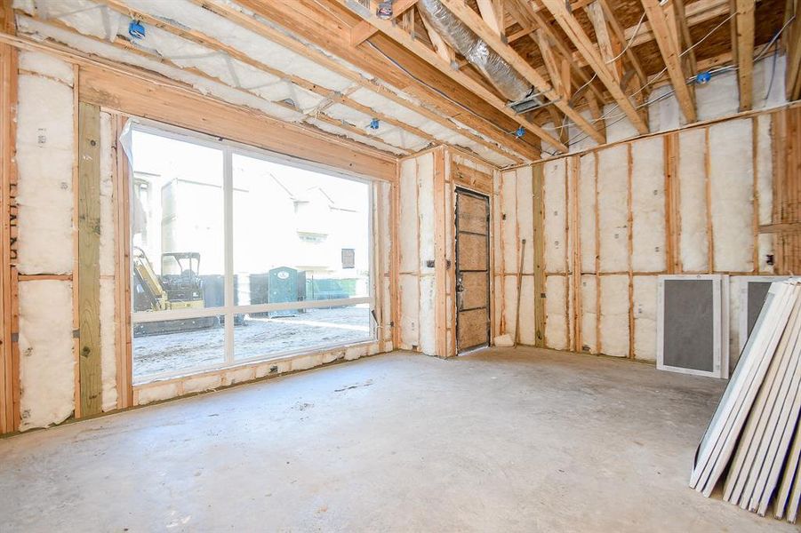 1st Floor Gameroom or Living Room. 24x48 tile to be installed. Large Architectural style Sierra Pacific windows installed.