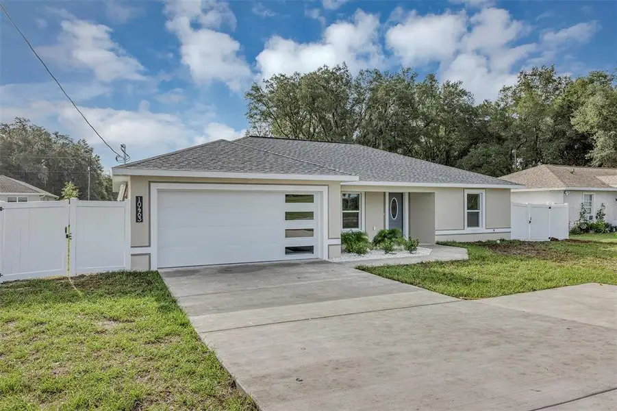 Front exterior of a new home in , Dunnellon, FL, highlighting curb appeal (Image 2). Front exterior of a new home in , Dunnellon, FL, highlighting curb appeal (Image 2).