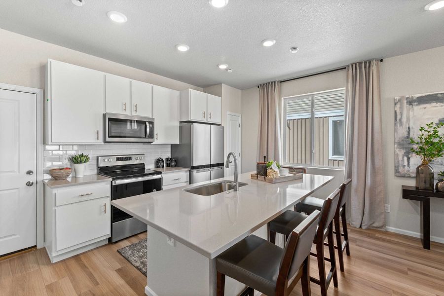 Furnished interior view inside a new home in Green Valley Ranch, Aurora (Image 8).