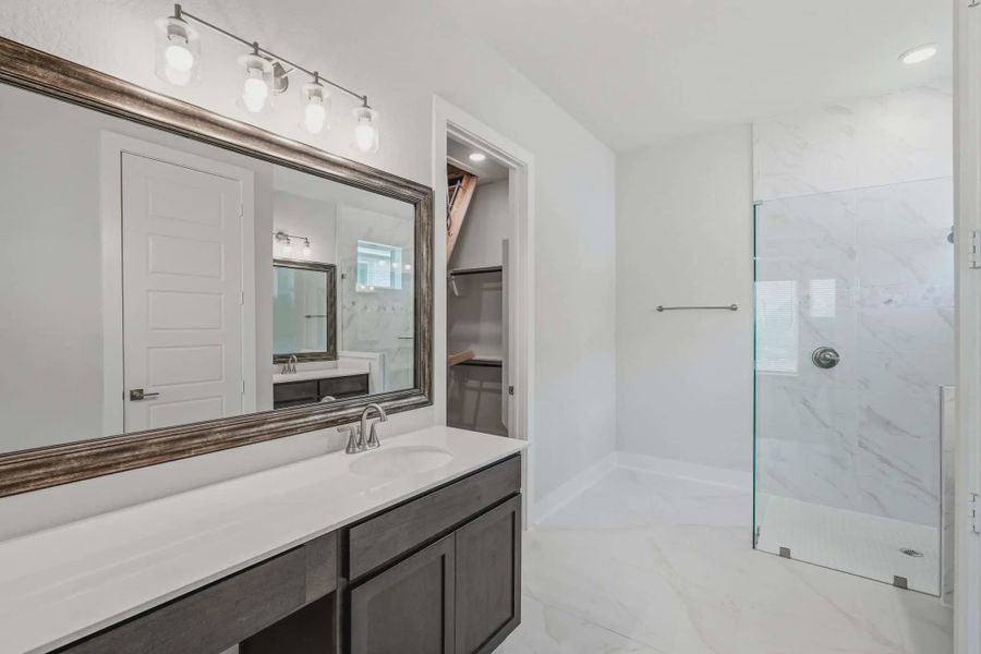 Representative furnished interior of a home built from the Mackenzie by Chesmar Homes in Esperanza 60's, Boerne (Image 9).