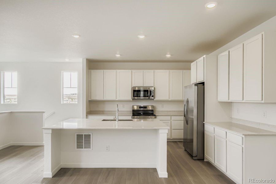 Furnished interior view inside a new home in Parterre: The Skyline Collection, Thornton (Image 7).