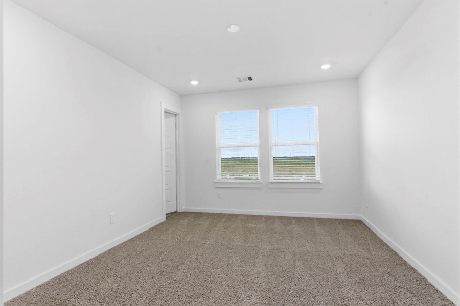 Spacious, unfurnished interior of a new home in , Iowa Colony (Image 41).