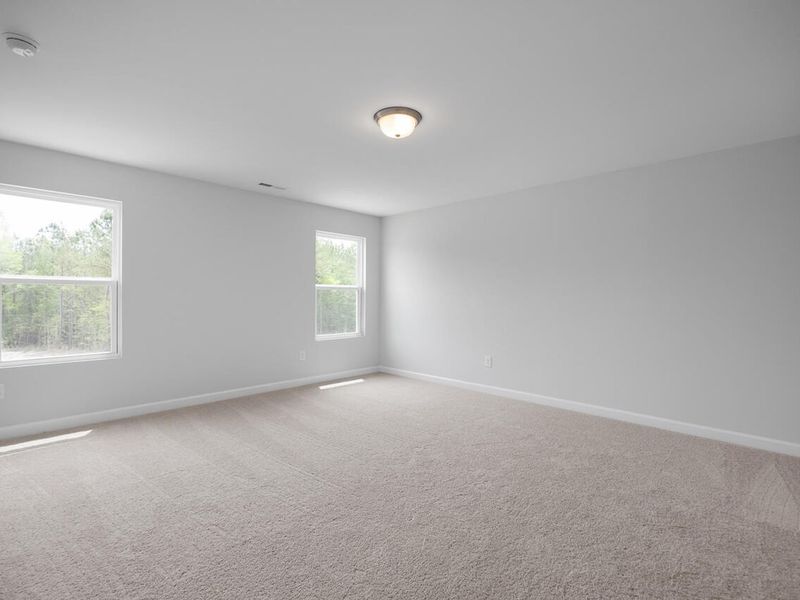 Spacious, unfurnished interior of a new home in Woodland Crossing, Zebulon (Image 16).