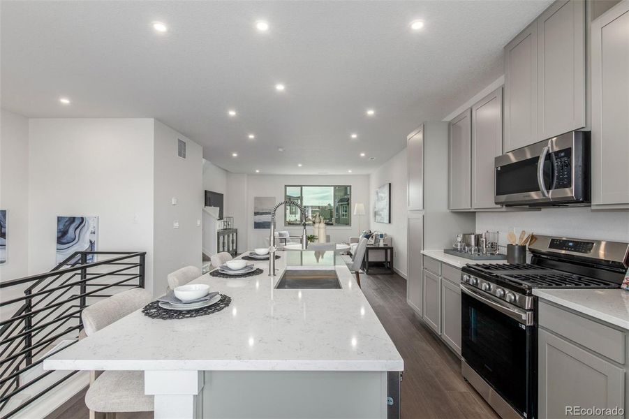 Furnished interior view inside a new home in The Commons at Victory Ridge, Colorado Springs (Image 10).