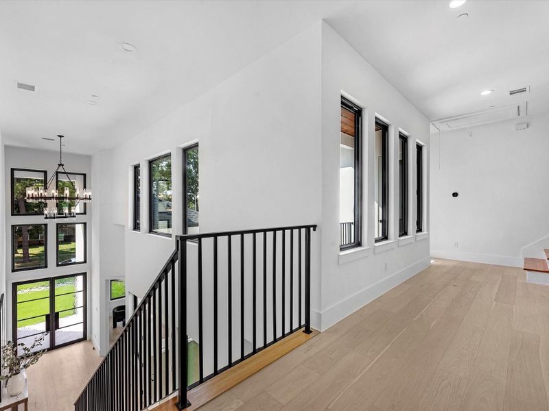 Black trim Anderson windows upgrade, upgraded wood flooring throughout, private balcony- this home has it all!