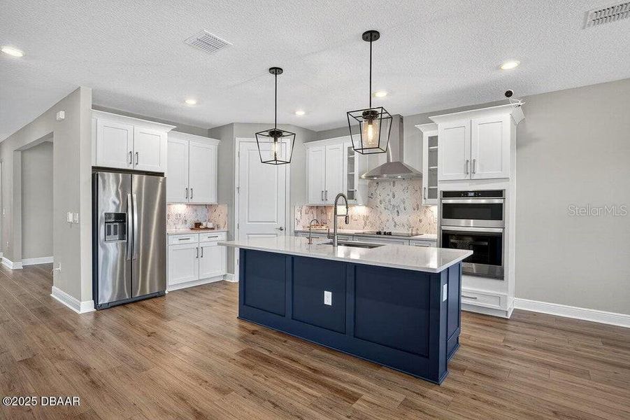 Furnished interior view inside a new home in Legends Preserve - Reserve Series, Daytona Beach (Image 6). Furnished interior view inside a new home in Legends Preserve - Reserve Series, Daytona Beach (Image 6).