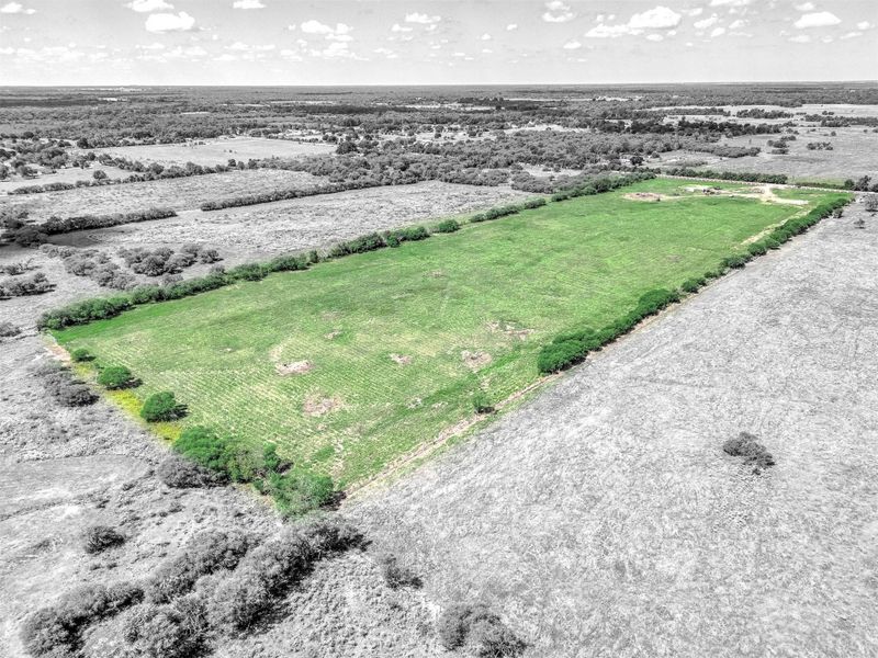 Photo provides another angle of the property, showing the overall lot and surrounding views for better perspective. Photo provides another angle of the property, showing the overall lot and surrounding views for better perspective.