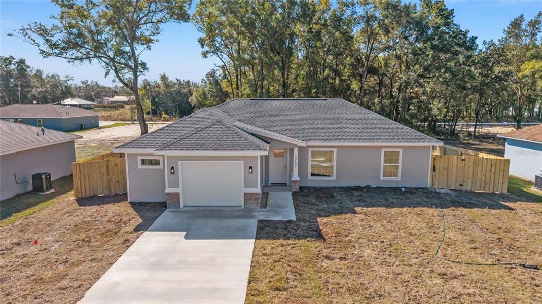 Front exterior of a new home in , Dunnellon, FL, highlighting curb appeal (Image 1). Front exterior of a new home in , Dunnellon, FL, highlighting curb appeal (Image 1).