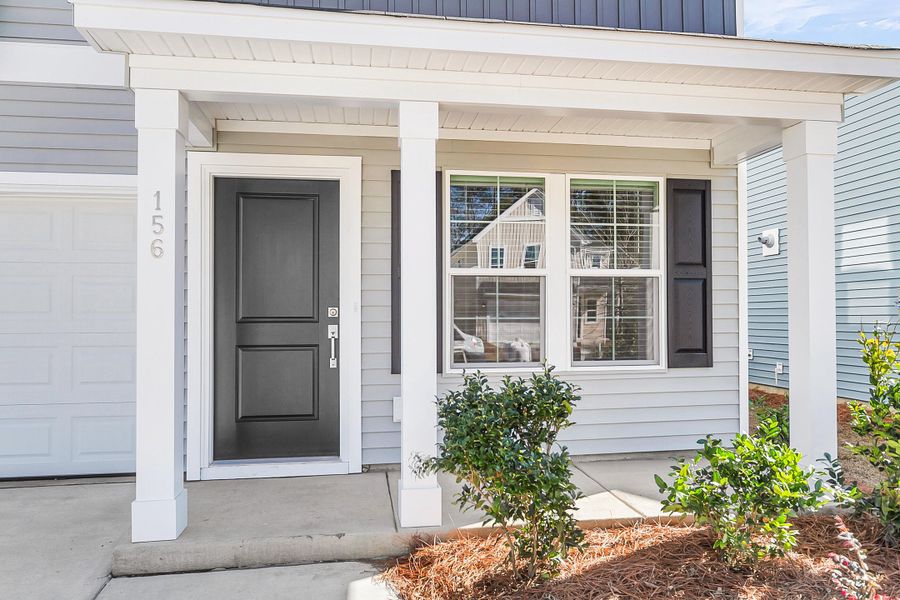 Exterior details and patio area of a home in Six Oaks, Summerville (Image 3).