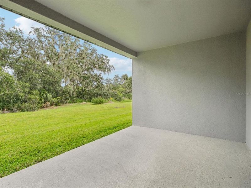 Exterior details and patio area of a home in Salt Meadows - Signature Series, Parrish (Image 3). Exterior details and patio area of a home in Salt Meadows - Signature Series, Parrish (Image 3).