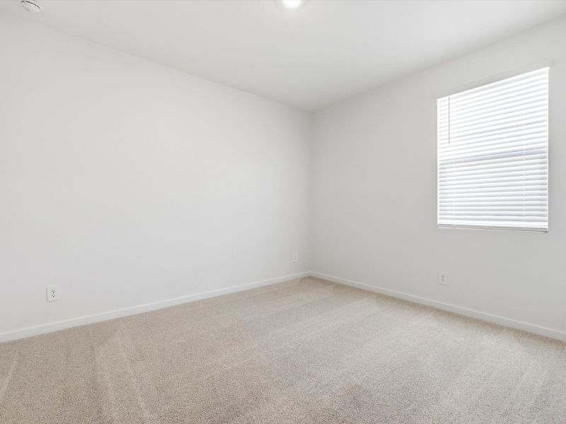 Spacious, unfurnished interior of a new home in White Tank Foothills Reserve Series, Waddell (Image 21).