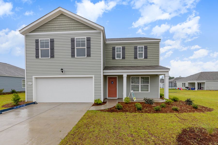 Representative exterior photo of a completed home built from the GALEN by D.R. Horton in The Meadows at Wildwood Village, Shallotte, NC (Image 1).