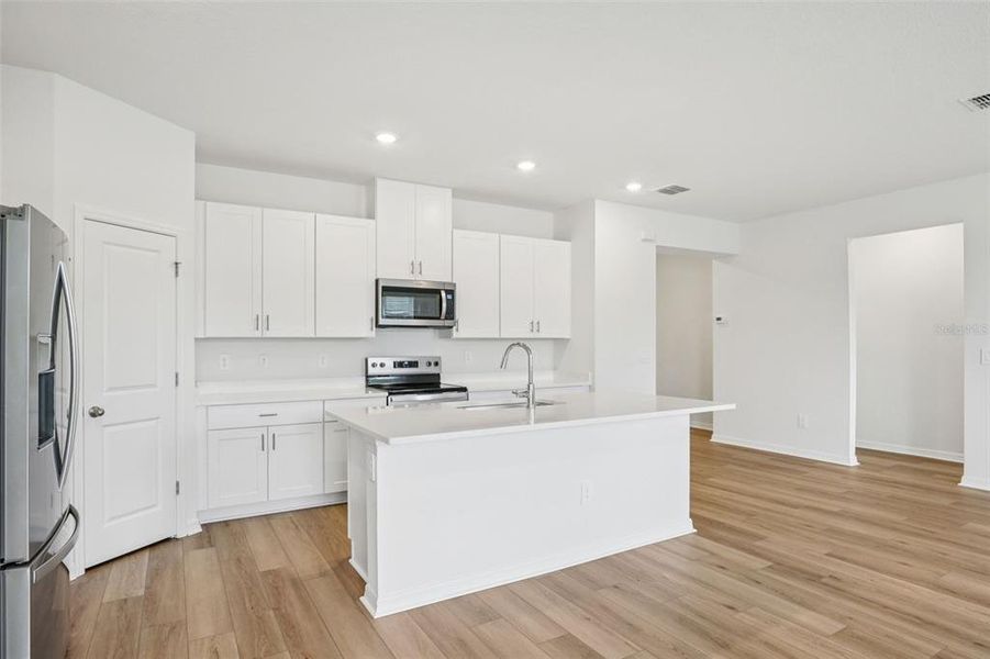 Furnished interior view inside a new home in Two Rivers - Classic Series, Zephyrhills (Image 13).