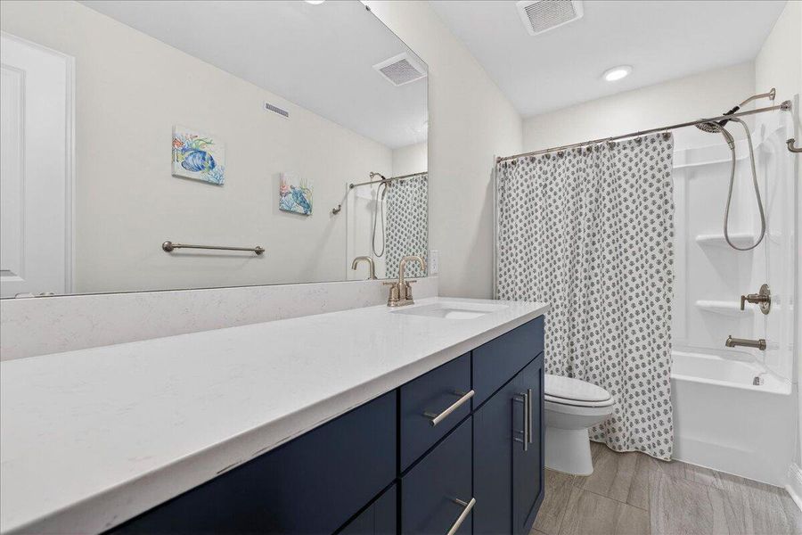 Furnished interior view inside a new home in Jasmine Point at Lakes of Cane Bay, Summerville (Image 19).