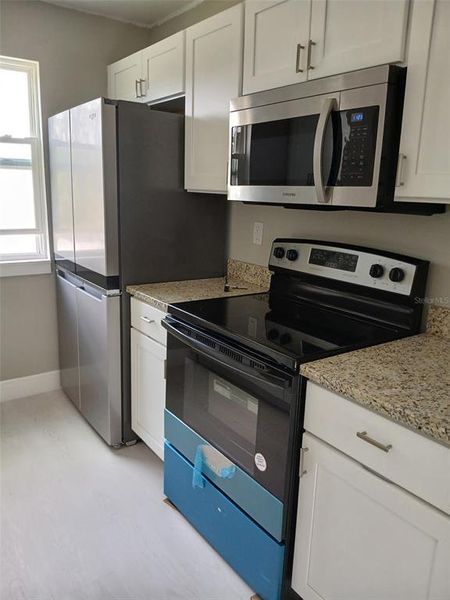 Furnished interior view inside a new home in , Gainesville (Image 9).