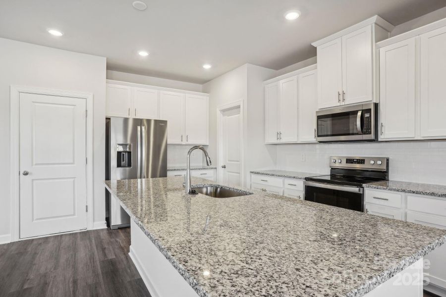 Furnished interior view inside a new home in Walnut Reserve, Conover (Image 4).