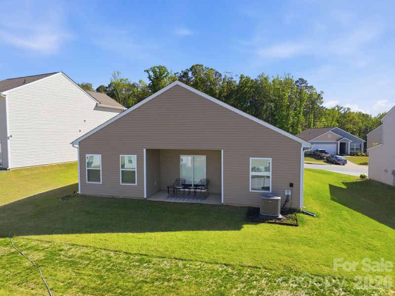 Exterior details and patio area of a home in Stagecoach Station, Gastonia (Image 25).