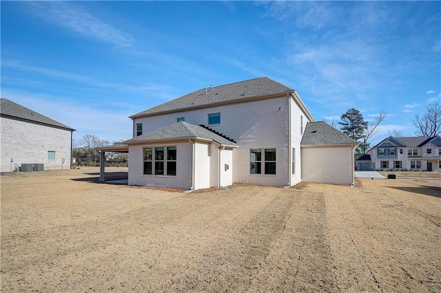 Exterior details and patio area of a home in Cambria at Traditions, Hampton (Image 22).