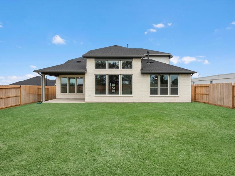 Exterior details and patio area of a home in Pecan Ridge, Fulshear (Image 3).