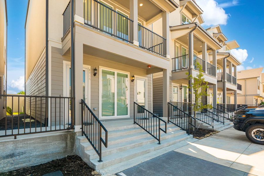 Front exterior of a new home in , Shenandoah, TX, highlighting curb appeal (Image 20). Front exterior of a new home in , Shenandoah, TX, highlighting curb appeal (Image 20).