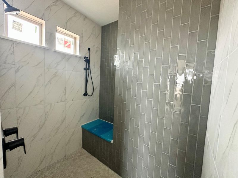 Bathroom with tiled shower