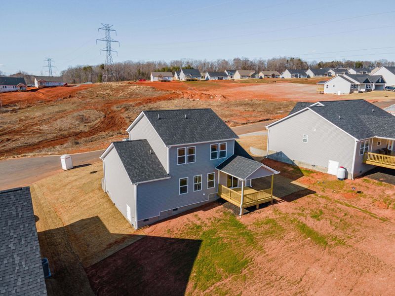 Representative exterior photo of a completed home built from the Sumter by Enchanted Homes in Ballentine Ridge, Lyman, SC (Image 31).