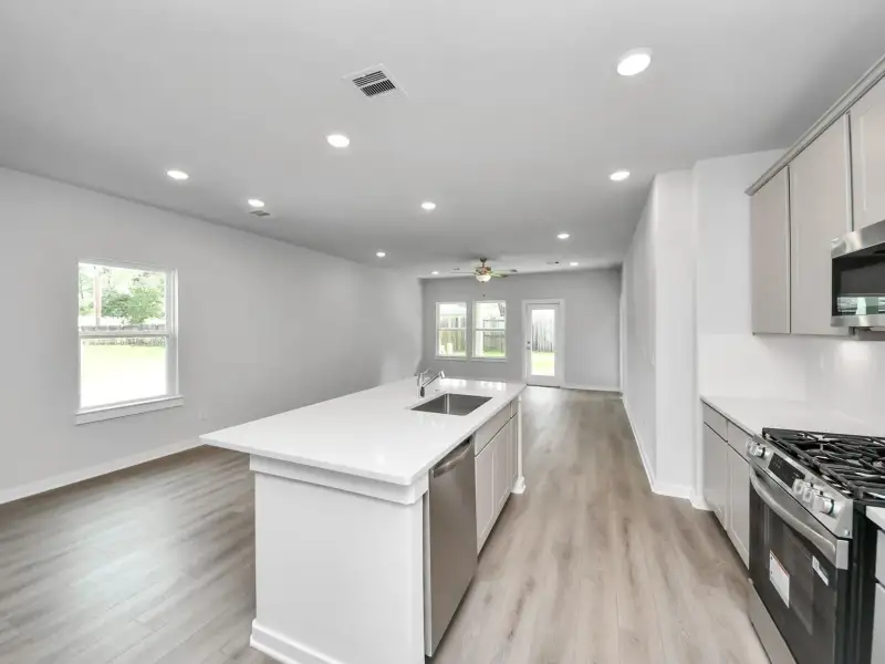 Furnished interior view inside a new home in Windmill Estates, Magnolia (Image 7).