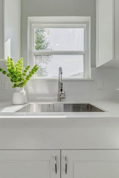 Stainless steel undermount sink with a high-end pull-down faucet