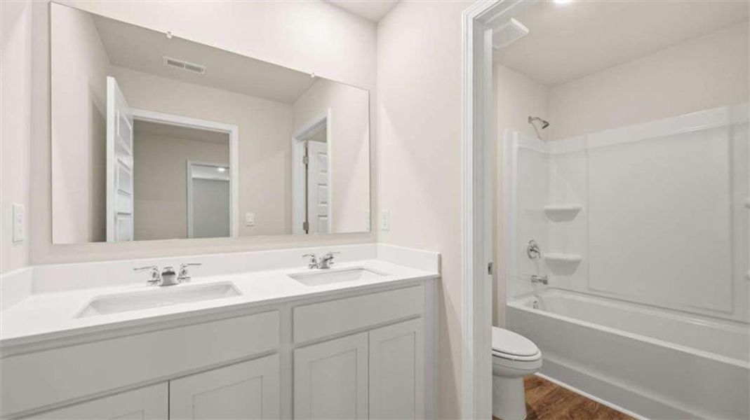 Furnished interior view inside a new home in Bridle Creek, Locust Grove (Image 3). Furnished interior view inside a new home in Bridle Creek, Locust Grove (Image 3).