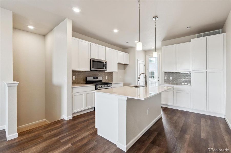 Furnished interior view inside a new home in Townhome Collection at Grand Vue at Interlocken, Broomfield (Image 8).
