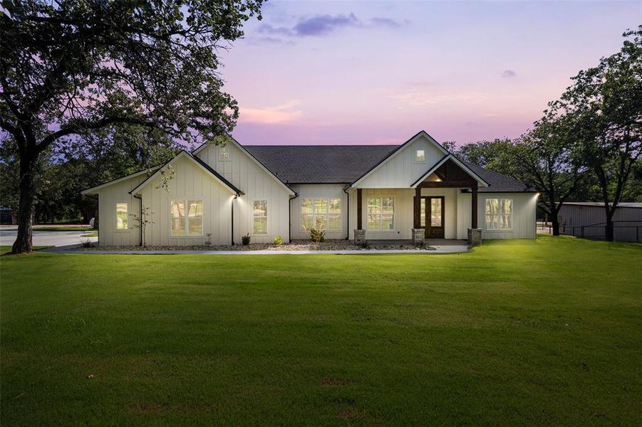 Front exterior of a new home in , Tolar, TX, highlighting curb appeal (Image 27). Front exterior of a new home in , Tolar, TX, highlighting curb appeal (Image 27).