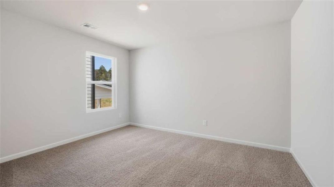 Spacious, unfurnished interior of a new home in The Preserve at Agricultural Village, Perry (Image 23).