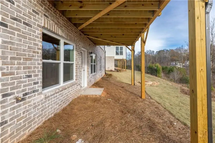 Exterior details and patio area of a home in Aberdeen, Hoschton (Image 40).
