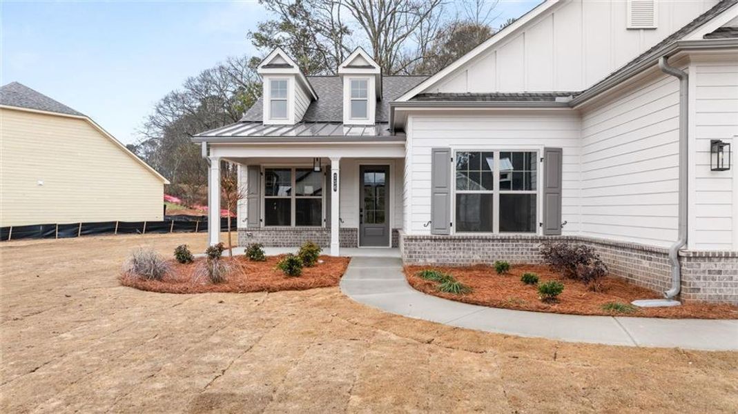 Exterior details and patio area of a home in Soleil Belmont Park, Canton (Image 26).