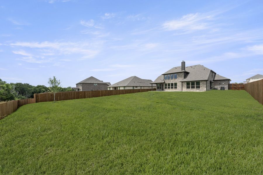 Exterior details and patio area of a home in Lovers Landing, Forney (Image 4).