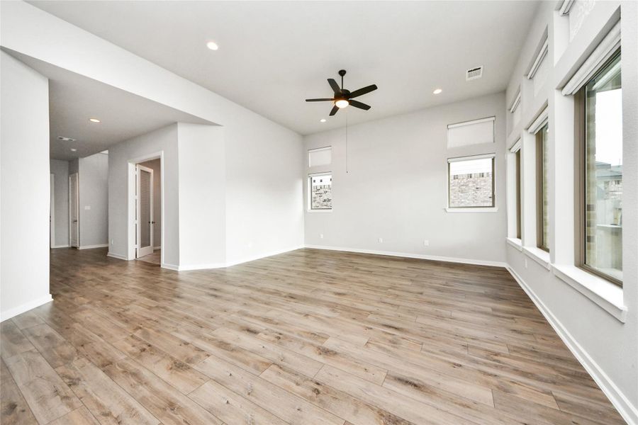 Spacious family room with clean lines and open-concept layout