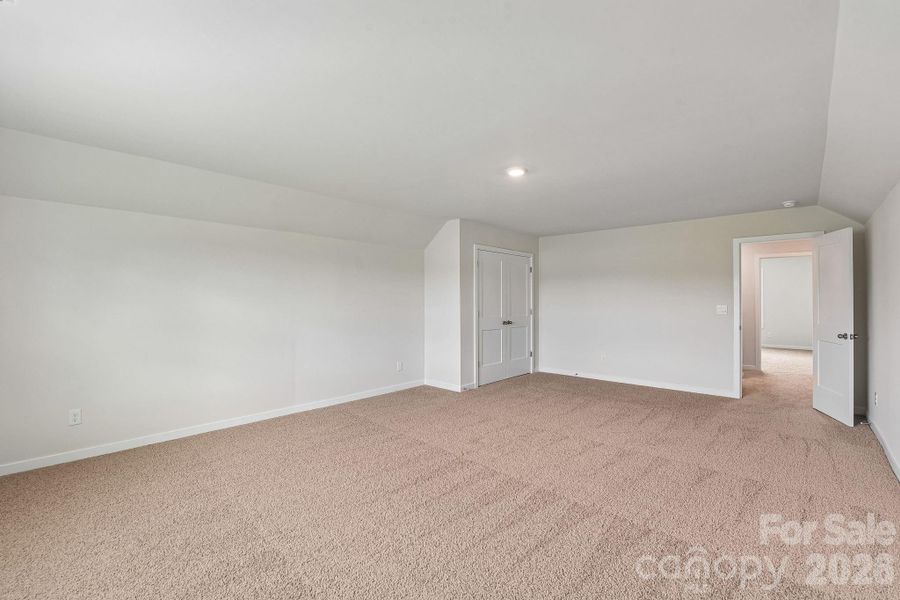 Spacious, unfurnished interior of a new home in Sanctuary at Southgate, Indian Trail (Image 22).