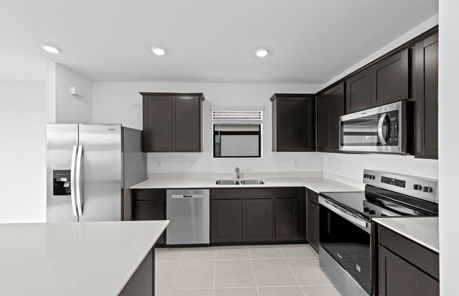 Furnished interior view inside a new home in Caloosa Cove, Labelle (Image 5).