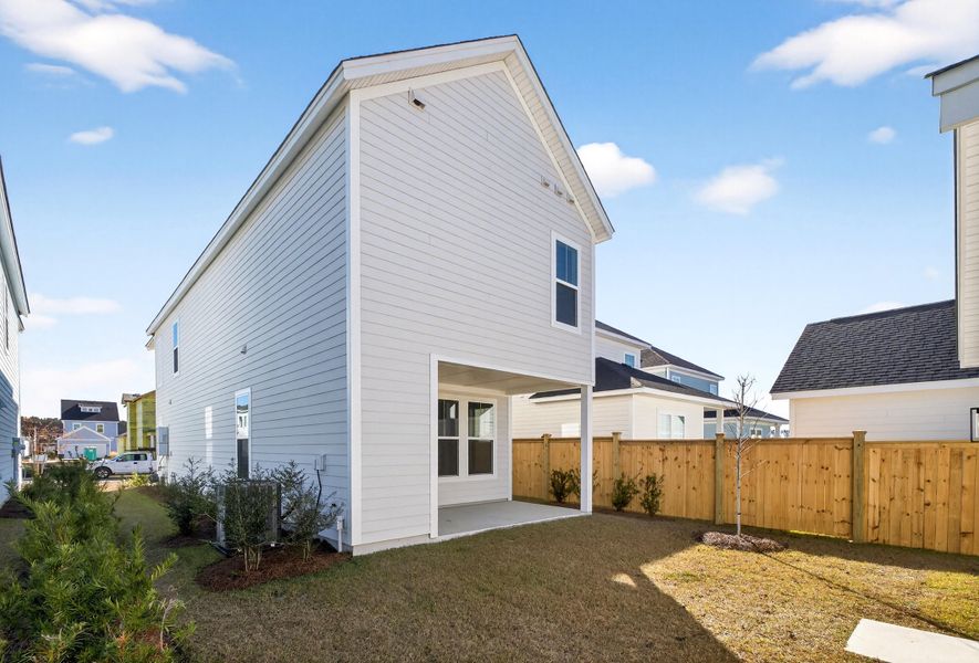 Exterior details and patio area of a home in Nexton - Midtown, Summerville (Image 11).