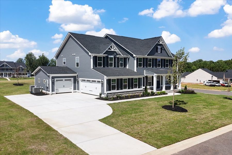 Front exterior of a home in the Everly Estates community, located in Spartanburg, SC (Image 3). Front exterior of a home in the Everly Estates community, located in Spartanburg, SC (Image 3).