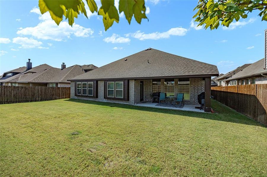 Front exterior of a new home in The Oasis at North Grove 60-70, Waxahachie, TX, highlighting curb appeal (Image 2). Front exterior of a new home in The Oasis at North Grove 60-70, Waxahachie, TX, highlighting curb appeal (Image 2).