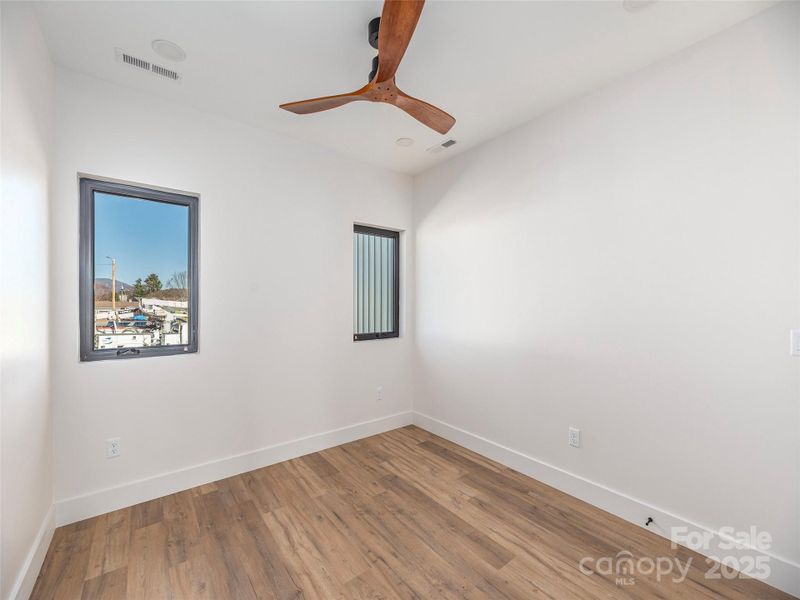 Spacious, unfurnished interior of a new home in , Waynesville (Image 11).