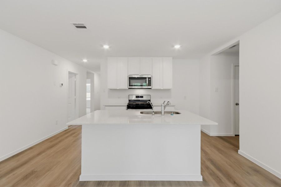 Furnished interior view inside a new home in New Waverly Station, New Waverly (Image 6). Furnished interior view inside a new home in New Waverly Station, New Waverly (Image 6).