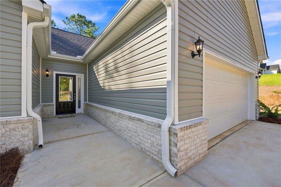 Exterior details and patio area of a home in , Gray (Image 3).
