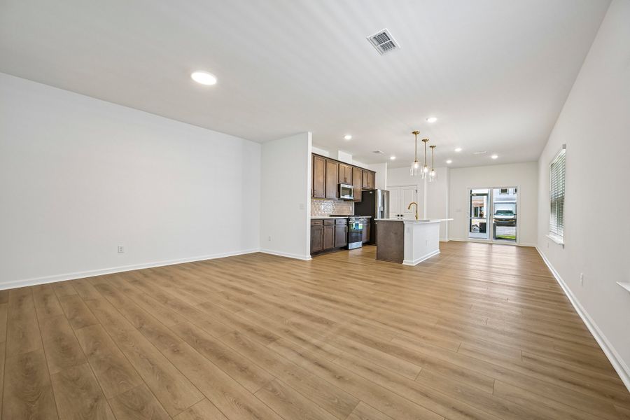 Representative unfurnished interior of a home built from the Emma II by Ashton Woods in The Point, Rolesville (Image 10).