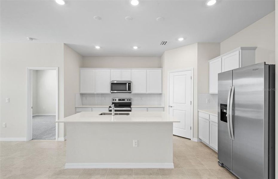 Furnished interior view inside a new home in The Strand at Cedar Grove, North Port (Image 8).